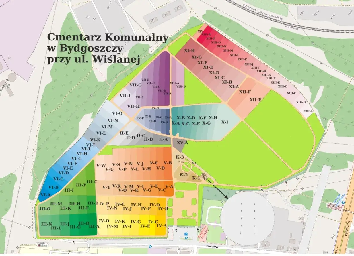 Mapa Cmentarza Komunalnego w Bydgoszczy przy ul. Wiślanej. Kolorowe sektory z oznaczeniami literowo-cyfrowymi wskazują poszczególne kwatery.